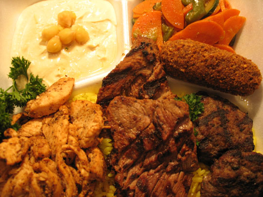 Jerusalem Cafe's Combo Feast with grilled meats, chicken, falafel, hummus and vegetables